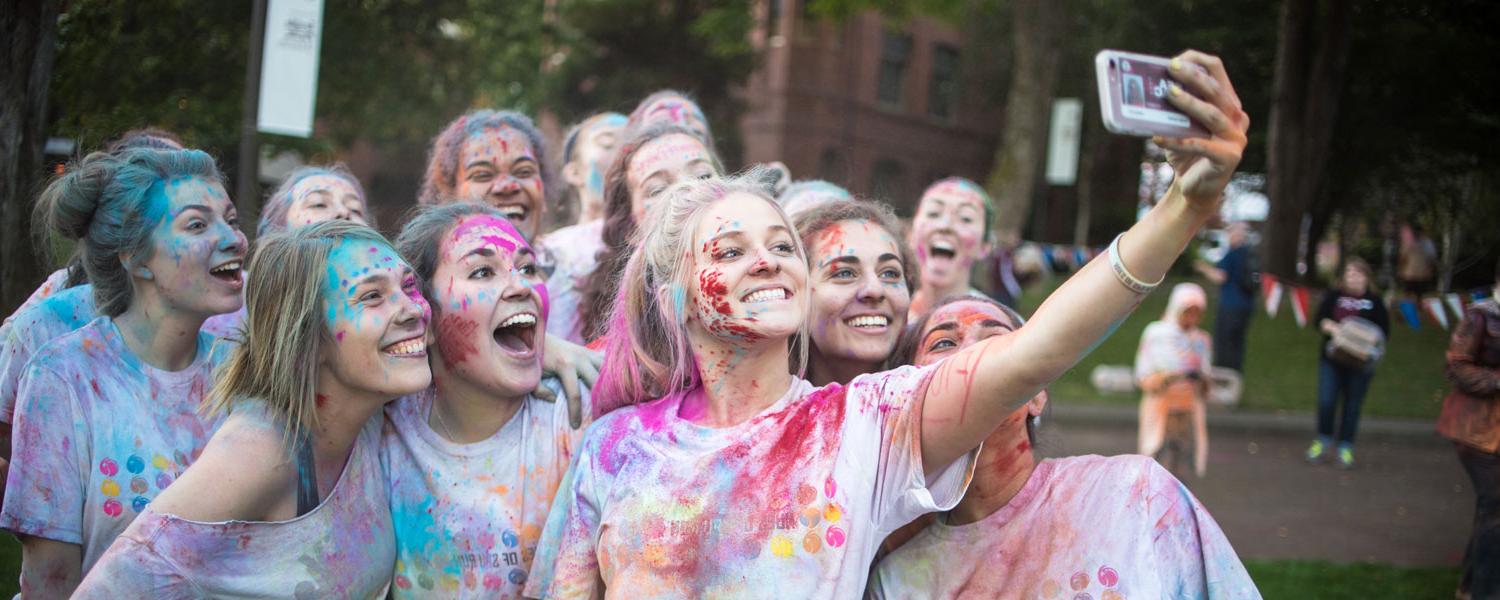 Students taking selfie after Color Run